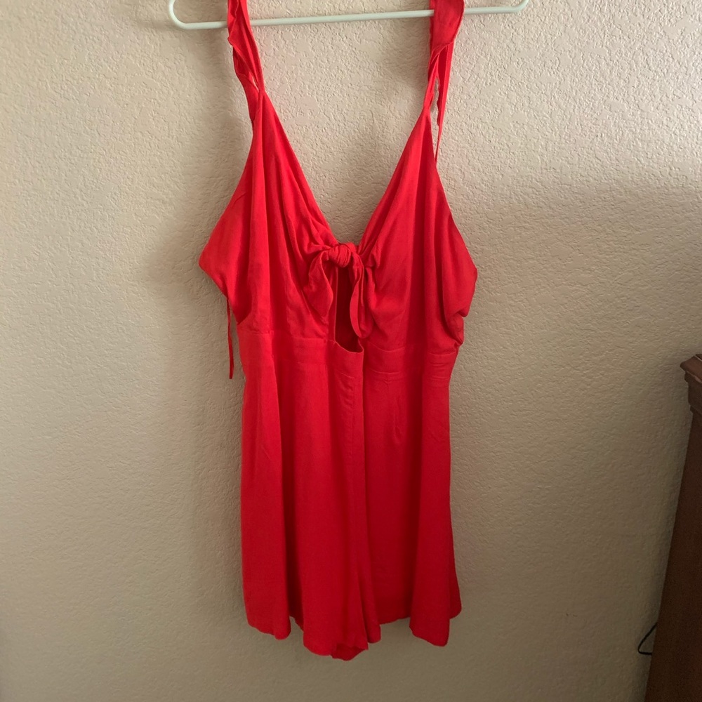 Bright red, front-tie romper